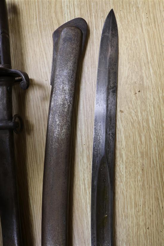 A Victorian sabre with etched blade and a mid 19th century sabre, both with scabbards